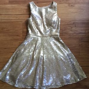 Gorgeous gold sequined open back dress